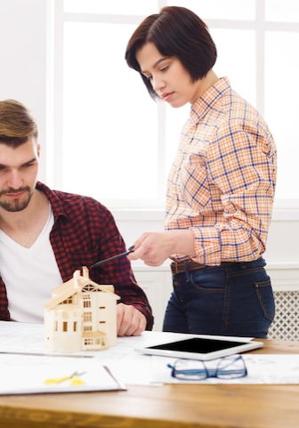 two-colleagues-discussing-archit